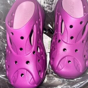 Caged purple crocs